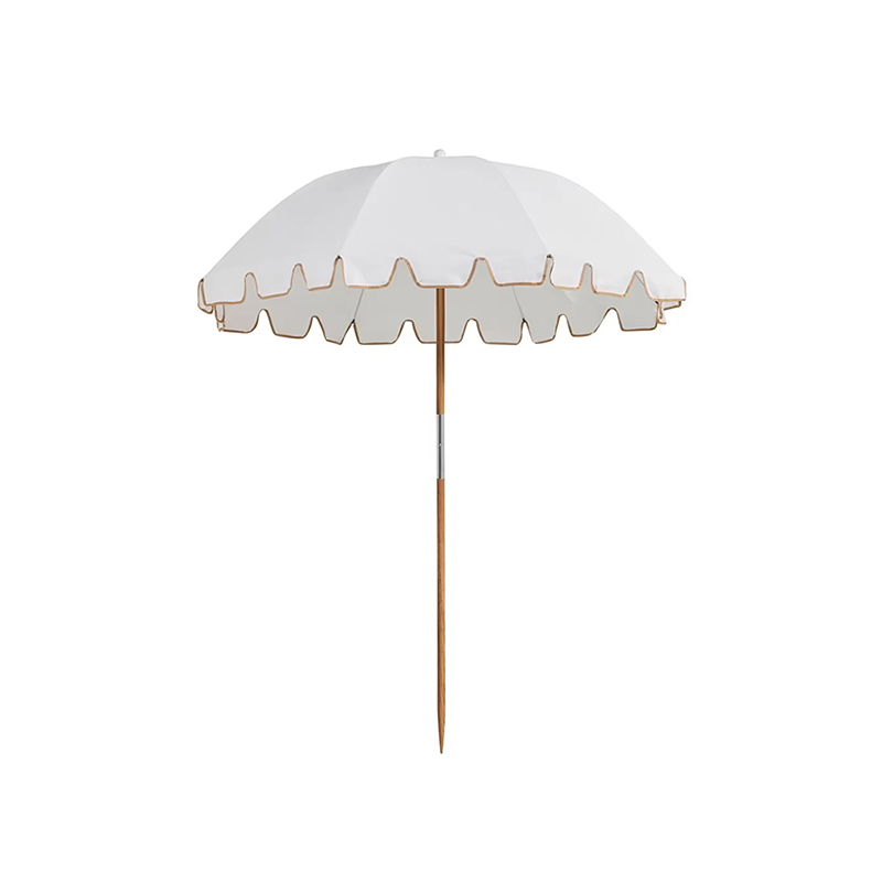 Umbrella iniompartha an trá um chosaint gréine iniompartha